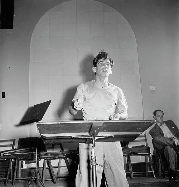 Portrait of Leonard Bernstein, Carnegie Hall, New York, N.Y. 1946. Creator: William Paul Gottlieb