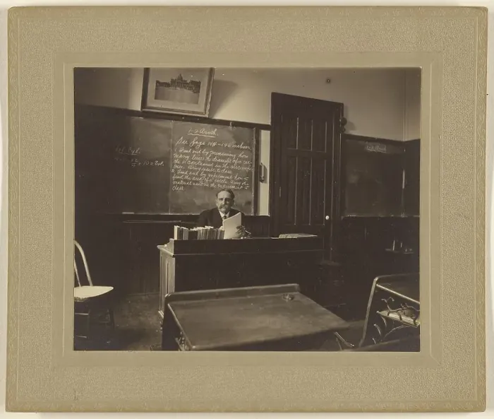 Framed Print : Portrait of a male mathematics teacher with moustache seated at his classroom desk, about 1900. Creator: Unknown Framed Print : Portrait of a male mathematics teacher with moustache seated at his classroom desk, about 1900. Creator: Unknown