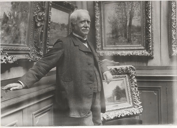 Portrait of Paul Durand-Ruel (1831-1922) in his gallery, c. 1910