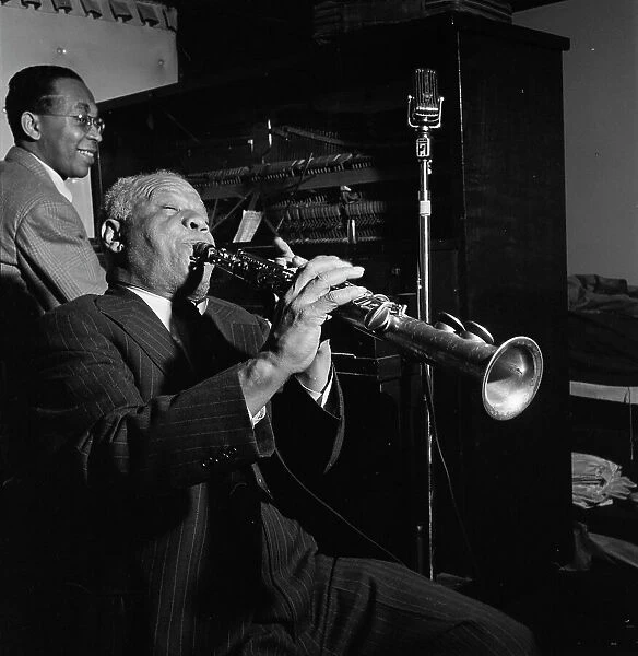 Portrait of Sidney Bechet and Lloyd Phillips, Jimmy Ryan's (Club), New York, N.Y. ca. June 1947. Creator: William Paul Gottlieb