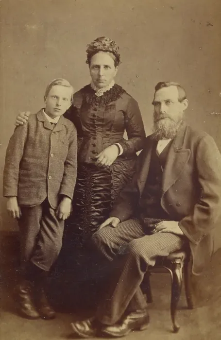 Framed Print : Portrait of an unidentified family: mother and son standing, bearded father seated, 1865-1875. Creator: John McKean Framed Print : Portrait of an unidentified family: mother and son standing, bearded father seated, 1865-1875. Creator: John McKean