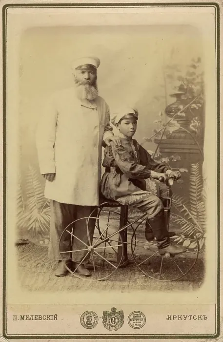 Framed Print : Portrait of an unknown man with a boy sitting on a bicycle, end of 19th century. Creator: PA Milevskii Framed Print : Portrait of an unknown man with a boy sitting on a bicycle, end of 19th century. Creator: PA Milevskii