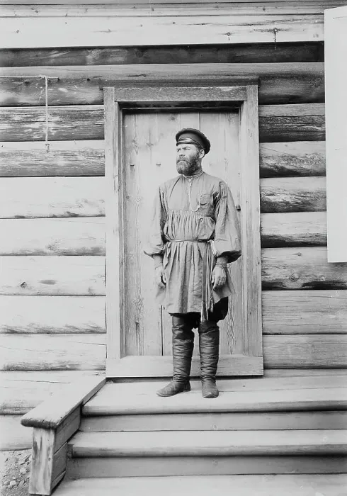 Framed Print : Portrait of an unknown man on the porch of a wooden house, 1900. Creators: I. A. Podgorbunskii, V. I. Podgorbunskii Framed Print : Portrait of an unknown man on the porch of a wooden house, 1900. Creators: I. A. Podgorbunskii, V. I. Podgorbunskii