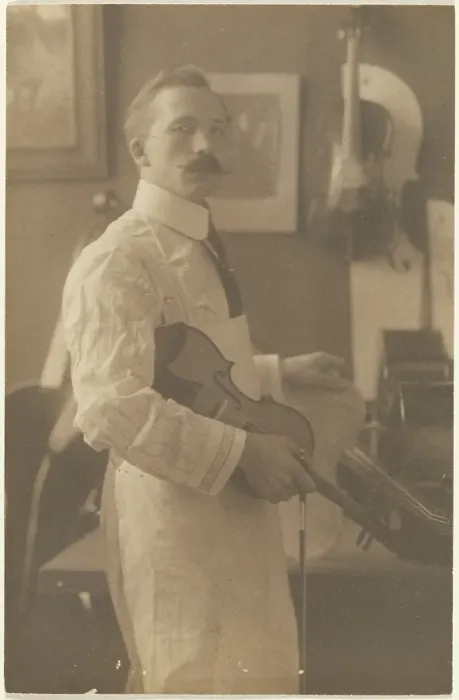 Framed Print : Portrait of a Violin Maker in Studio, 1895-1943. Creator: Louis Fleckenstein Framed Print : Portrait of a Violin Maker in Studio, 1895-1943. Creator: Louis Fleckenstein