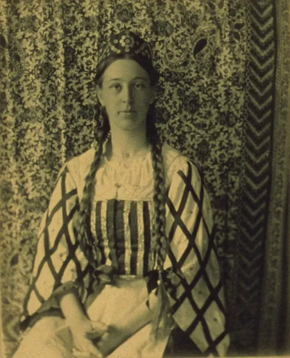Framed Print : Portrait of a woman with braids in front of a paisley backdrop, c1900. Creator: Frances S. Allen Framed Print : Portrait of a woman with braids in front of a paisley backdrop, c1900. Creator: Frances S. Allen