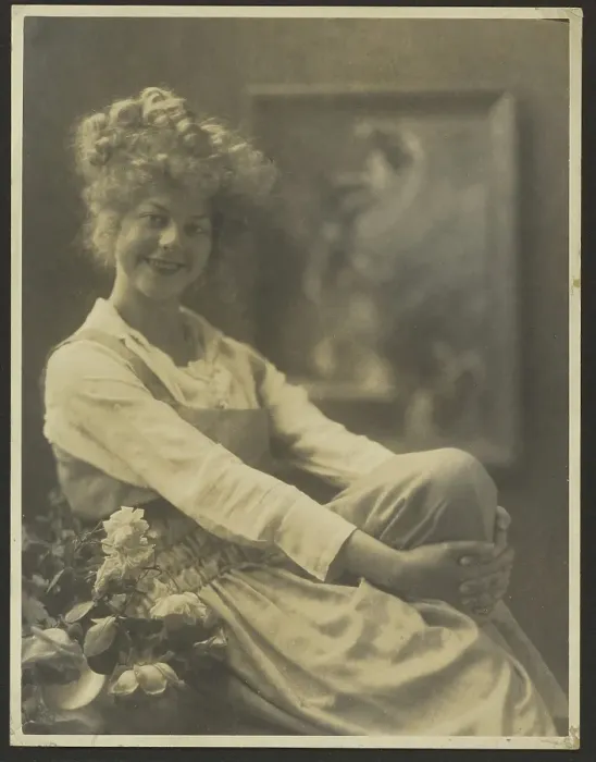 Framed Print : Portrait of a Woman in Pinafore with Flowers, 1907-1943. Creator: Louis Fleckenstein Framed Print : Portrait of a Woman in Pinafore with Flowers, 1907-1943. Creator: Louis Fleckenstein