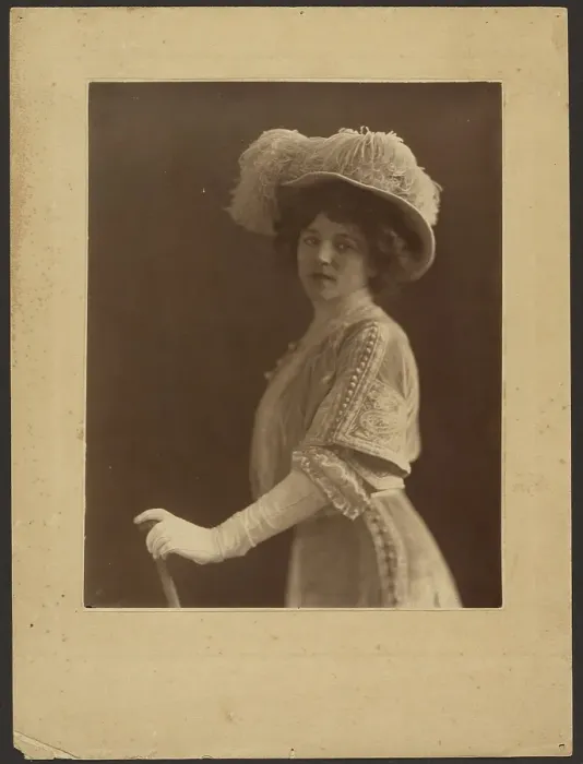 Framed Print : Portrait of a Woman Standing with Umbrella, 1907-1943. Creator: Louis Fleckenstein Framed Print : Portrait of a Woman Standing with Umbrella, 1907-1943. Creator: Louis Fleckenstein