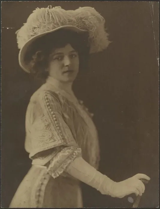 Framed Print : Portrait of a Woman Standing with Umbrella, 1907-1943. Creator: Louis Fleckenstein Framed Print : Portrait of a Woman Standing with Umbrella, 1907-1943. Creator: Louis Fleckenstein
