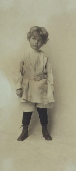 Framed Print : Portrait of a young boy standing in short pants and belted shirt, c1900. Creator: Misses Selby Framed Print : Portrait of a young boy standing in short pants and belted shirt, c1900. Creator: Misses Selby