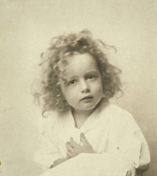 Portrait of a young girl with tousled hair, c1900. Creator: Misses Selby