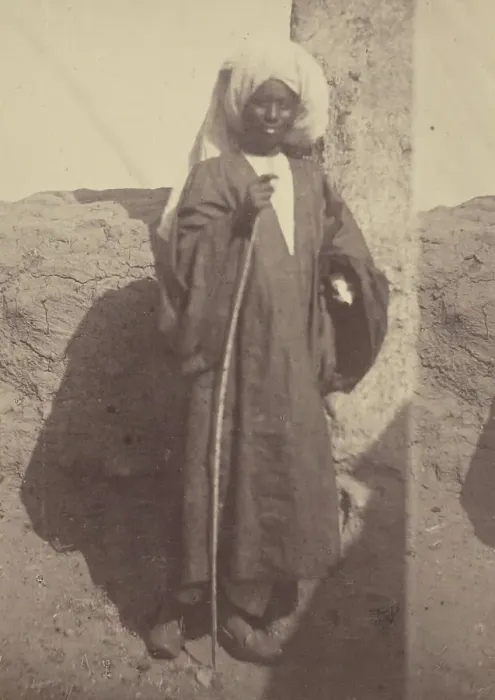 Framed Print : Portrait of a Young North African Man Standing Against a Pillar, 1865. Creator: Theodule Deveria