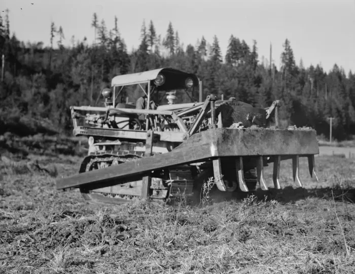 Framed Print : Possibly: Bulldozer raises and pushes stump on cut-over farm, Lewis County, Western Washington, 1939 Creator: Dorothea Lange Framed Print : Possibly: Bulldozer raises and pushes stump on cut-over farm, Lewis County, Western Washington, 1939 Creator: Dorothea Lange