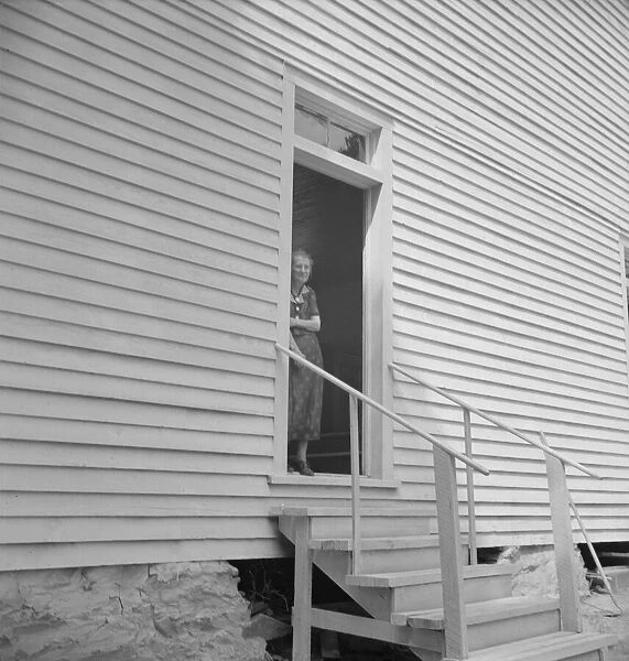 Possibly: Conversation among members... Wheeleys Church, Gordonton, North Carolina, 1939. Creator: Dorothea Lange