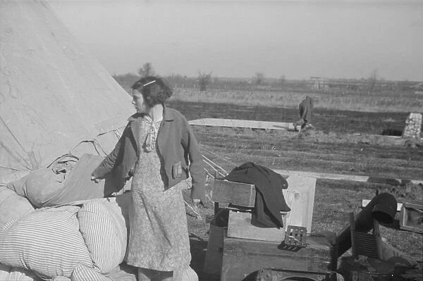 Possibly: A girl in the camp for white flood refugees, Forrest City, Arkansas, 1937. Creator: Walker Evans