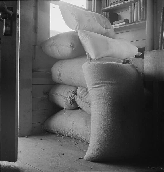 Possibly: Interior of farmer's two-room log home, FSA borrower, Boundary County, Idaho, 1939. Creator: Dorothea Lange