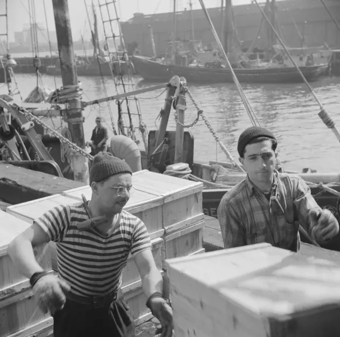 Framed Print : Possibly: Loaders placing fish that has been taken from boats, boxed, and iced... New York, 1943. Creator: Gordon Parks Framed Print : Possibly: Loaders placing fish that has been taken from boats, boxed, and iced... New York, 1943. Creator: Gordon Parks