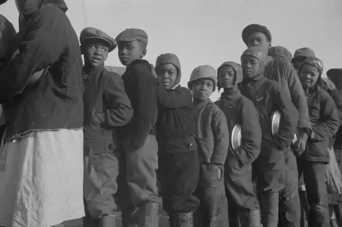 Framed Print : Possibly: Negroes in the lineup for food at the flood refugee camp, Forrest City, Arkansas, 1937. Creator: Walker Evans Framed Print : Possibly: Negroes in the lineup for food at the flood refugee camp, Forrest City, Arkansas, 1937. Creator: Walker Evans