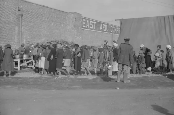Framed Print : Possibly: Negroes at mealtime in the flood refugee camp, Forrest City, Arkansas, 1937. Creator: Walker Evans Framed Print : Possibly: Negroes at mealtime in the flood refugee camp, Forrest City, Arkansas, 1937. Creator: Walker Evans