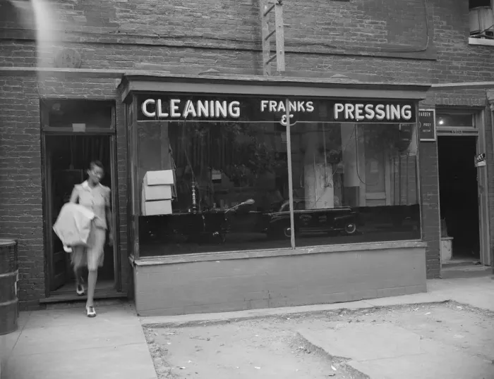 Framed Print : Possibly: A tailor in Franks cleaning and pressing establishment checking... Washington, DC, 1942. Creator: Gordon Parks Framed Print : Possibly: A tailor in Franks cleaning and pressing establishment checking... Washington, DC, 1942. Creator: Gordon Parks
