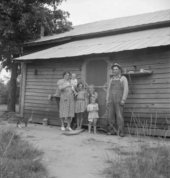Framed Print : Possibly: Tobacco sharecropper with his oldest daughter, Person County, North Carolina, 1939. Creator: Dorothea Lange Framed Print : Possibly: Tobacco sharecropper with his oldest daughter, Person County, North Carolina, 1939. Creator: Dorothea Lange