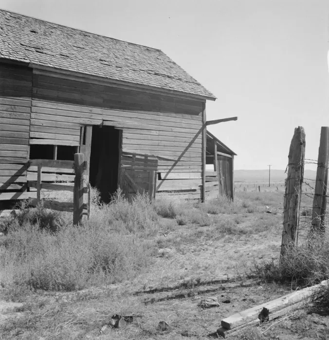 Framed Print : Possibly: Weeds crowd the barn door abandoned in Columbian Basin, Grant County, Washington, 1939. Creator: Dorothea Lange Framed Print : Possibly: Weeds crowd the barn door abandoned in Columbian Basin, Grant County, Washington, 1939. Creator: Dorothea Lange