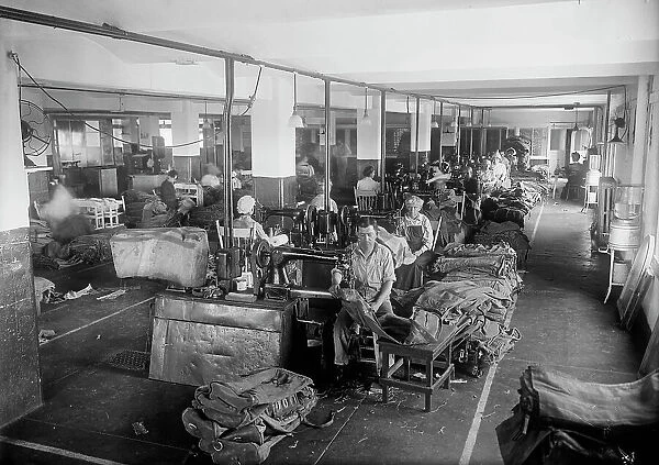 Post Office Department - Repairing Mailbags, 1914. Creator: Harris & Ewing. Post Office Department - Repairing Mailbags, 1914. Creator: Harris & Ewing