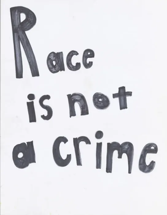 Framed Print : Poster reading Race is not a crime'used at Baltimore protests, April 2015 Framed Print : Poster reading Race is not a crime'used at Baltimore protests, April 2015