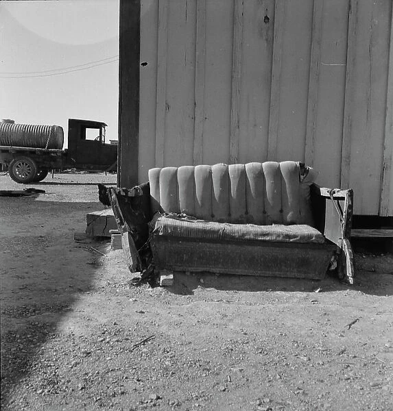 The postmaster's seat, Finlay, Texas, 1937. Creator: Dorothea Lange
