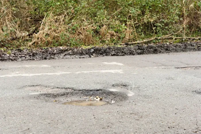 Framed Print : Pot holes in road surface 2017. Creator: Unknown Framed Print : Pot holes in road surface 2017. Creator: Unknown