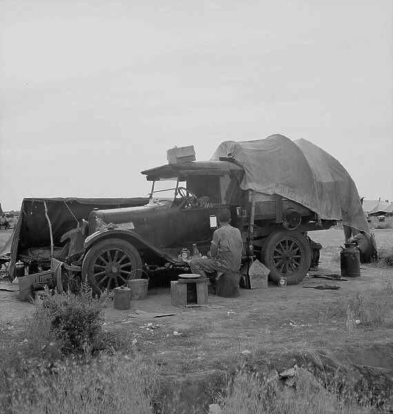 Potato picker in camp near Shafter, California, 1937. Creator: Dorothea Lange
