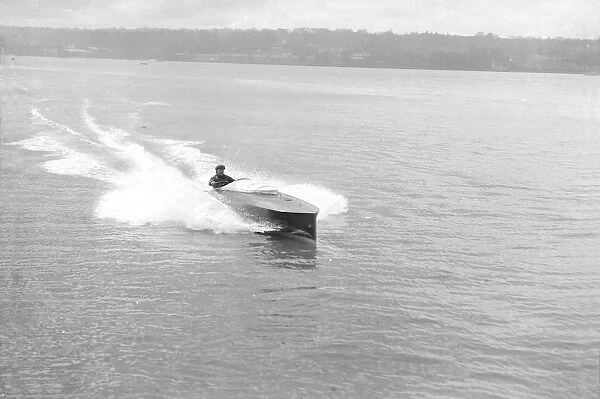 Power boat under way, 1914. Creator: Kirk & Sons of Cowes