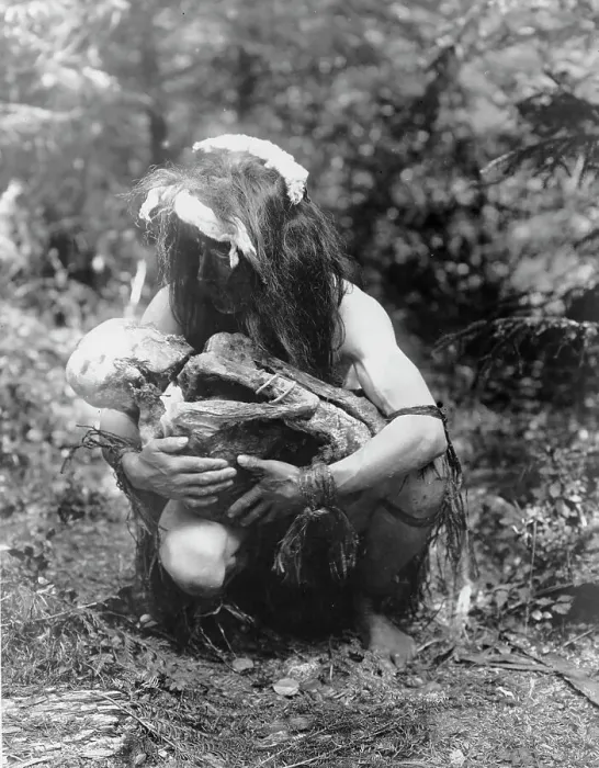 Framed Print : Preparing to eat the mummy, c1911. Creator: Edward Sheriff Curtis Framed Print : Preparing to eat the mummy, c1911. Creator: Edward Sheriff Curtis