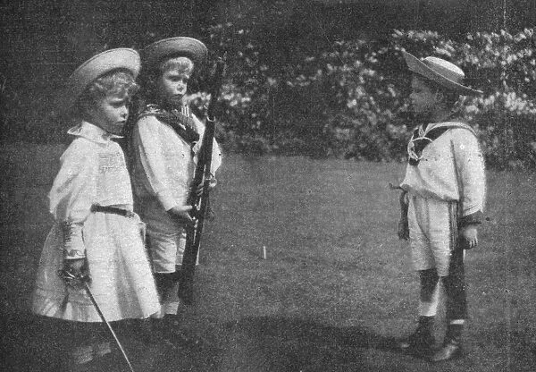 Prince Bertie of York drilling his brother and sister, 1900. Artist: Biograph Company