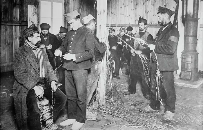 Framed Print : Prisoners at Zossen making straw shoes, 24 Feb 1915. Creator: Bain News Service Framed Print : Prisoners at Zossen making straw shoes, 24 Feb 1915. Creator: Bain News Service