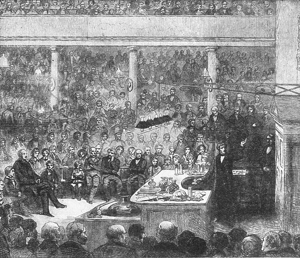 Professor Faraday lecturing at the Royal Institute... 1856, (1901). Creator: Unknown