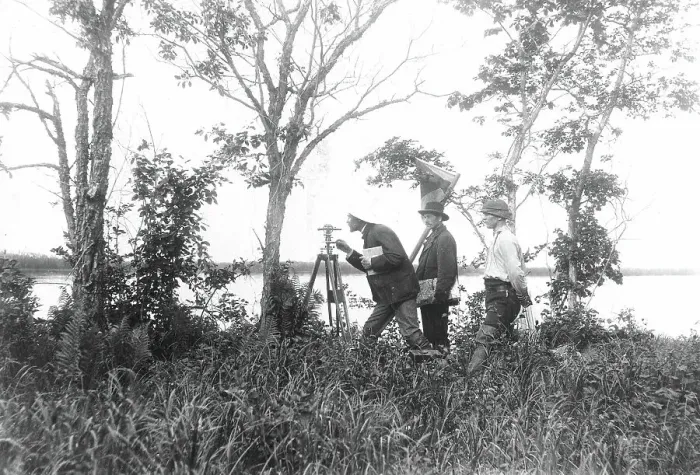 Framed Print : Prospectors conducting a triangulation survey from the bank of the Zeya River, 1909. Creator: Unknown Framed Print : Prospectors conducting a triangulation survey from the bank of the Zeya River, 1909. Creator: Unknown