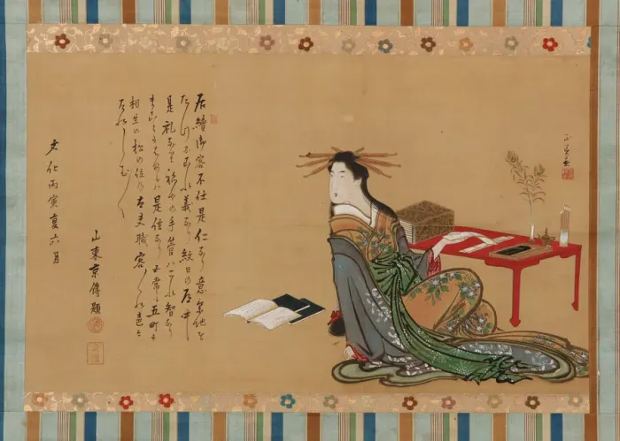 Framed Print : A prostitute sitting beside a writing table, Edo period, 1806, 6th month Framed Print : A prostitute sitting beside a writing table, Edo period, 1806, 6th month