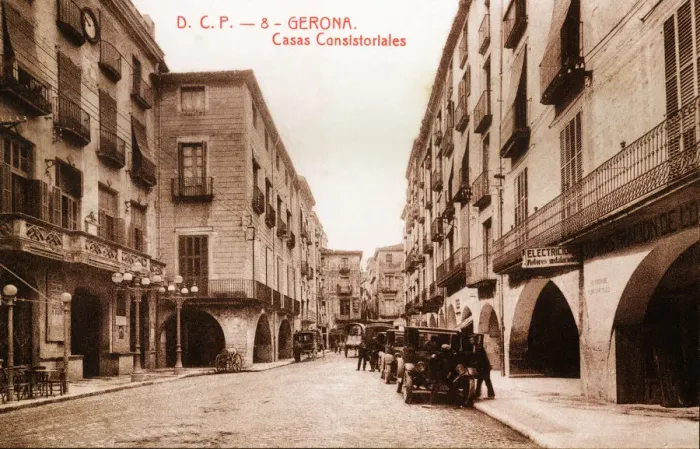 Framed Print : Public vehicles parked on Vi Square, in front of the town hall in Girona, in a postcard Framed Print : Public vehicles parked on Vi Square, in front of the town hall in Girona, in a postcard
