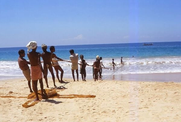 Pulling in Fishing Net from Indian Ocean, Hikkaduwa, West Coast Sri Lanka, 20th century. Artist: CM Dixon