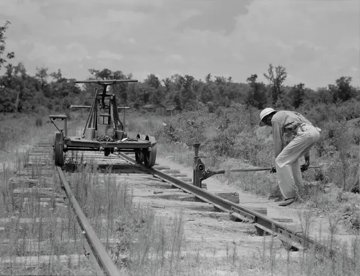 Framed Print : Pulling out the railroad tracks which lead to the closed sawmill, Careyville, Florida, 1937. Creator: Dorothea Lange Framed Print : Pulling out the railroad tracks which lead to the closed sawmill, Careyville, Florida, 1937. Creator: Dorothea Lange