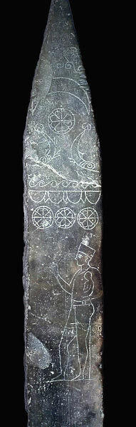 Punic stela of a priest holding a child