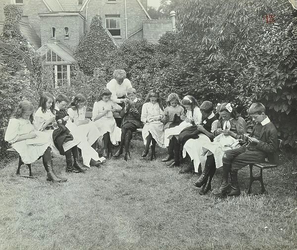 Pupils in the garden doing needlework, Birley House Open Air School, Forest Hill, London, 1908