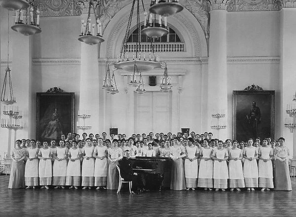 Pupils of the Smolny Institute for Noble Maidens at a Music Lesson, c. 1913. Artist: Bulla, Karl Karlovich (1853-1929)
