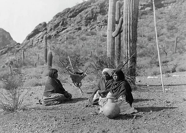 Qahatika women resting in Harvest Field-Qahatika, c1907. Creator: Edward Sheriff Curtis