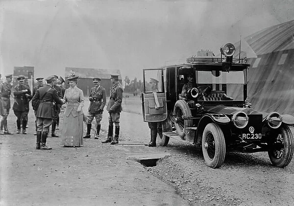 Queen Mary visits aerodrome shed, 5 Jul 1917. Creator: Bain News Service