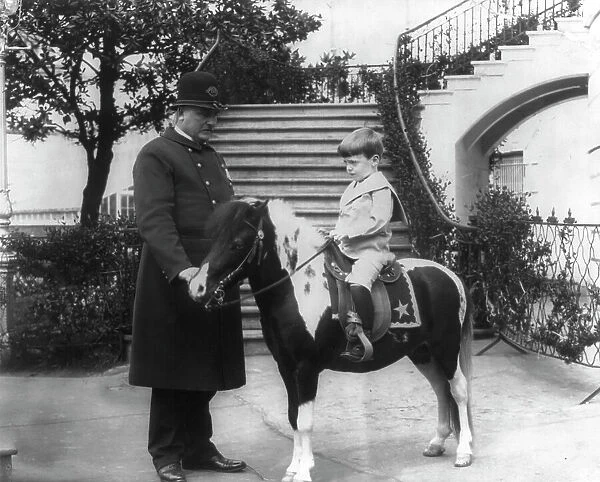 Quentin Roosevelt instructed in horsemanship at the White House, c1902 June 17. Creator: Frances Benjamin Johnston
