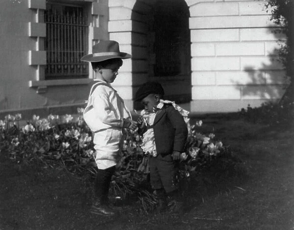 Quentin Roosevelt (left) and his little playmate, between 1900 and1905. Creator: Frances Benjamin Johnston