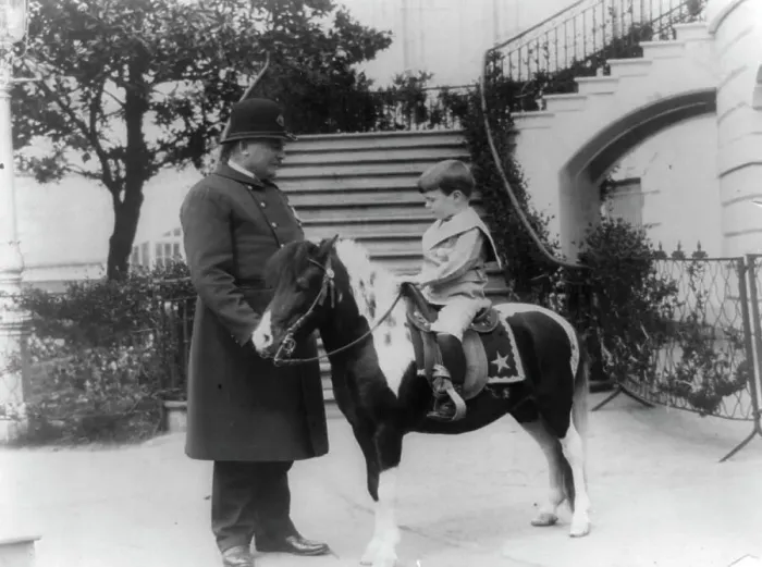 Framed Print : Quentin Roosevelt on pony beside White House policeman, 1905. Creator: Frances Benjamin Johnston Framed Print : Quentin Roosevelt on pony beside White House policeman, 1905. Creator: Frances Benjamin Johnston