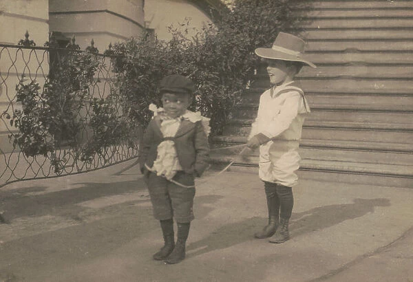 Quentin Roosevelt and Roswell Pinckney at play, c1902 June 17. Creator: Frances Benjamin Johnston