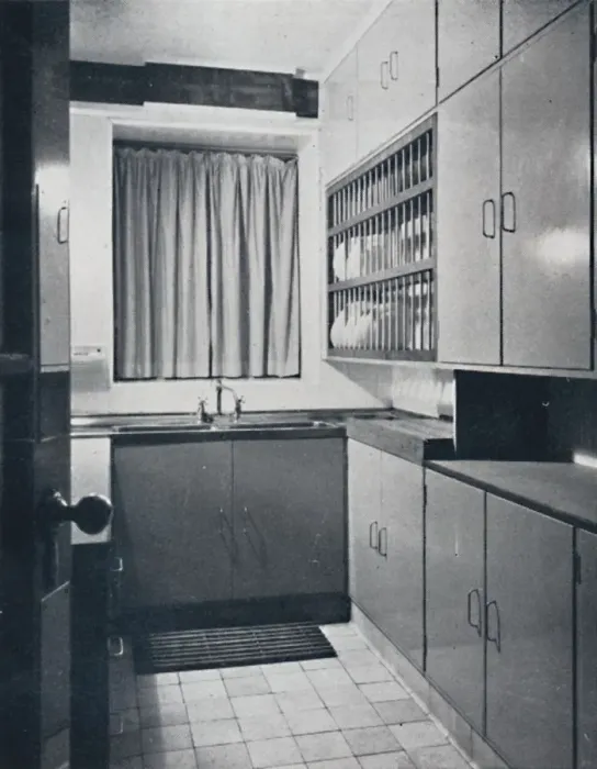 Framed Print : R. W. Symonds and Partner, L. & A. R. I. B. A. - Kitchen: Putty-coloured cellulosed fiitments Framed Print : R. W. Symonds and Partner, L. & A. R. I. B. A. - Kitchen: Putty-coloured cellulosed fiitments
